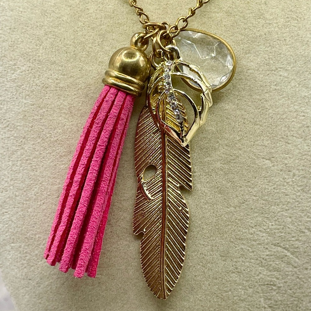 Gold Tone Necklace with 4 Pendants-Pink Tassel, Gold Feather, Crystal, and Leaf